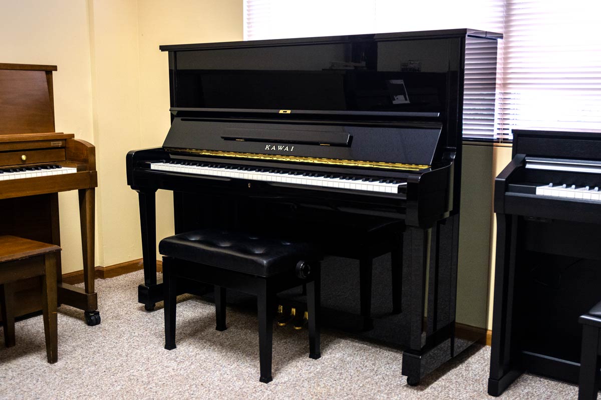buy a new upright piano